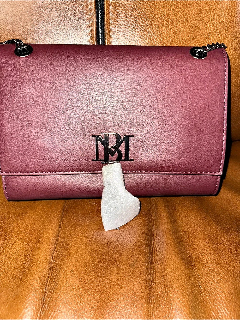 Chain Shoulder Bag in wine color.